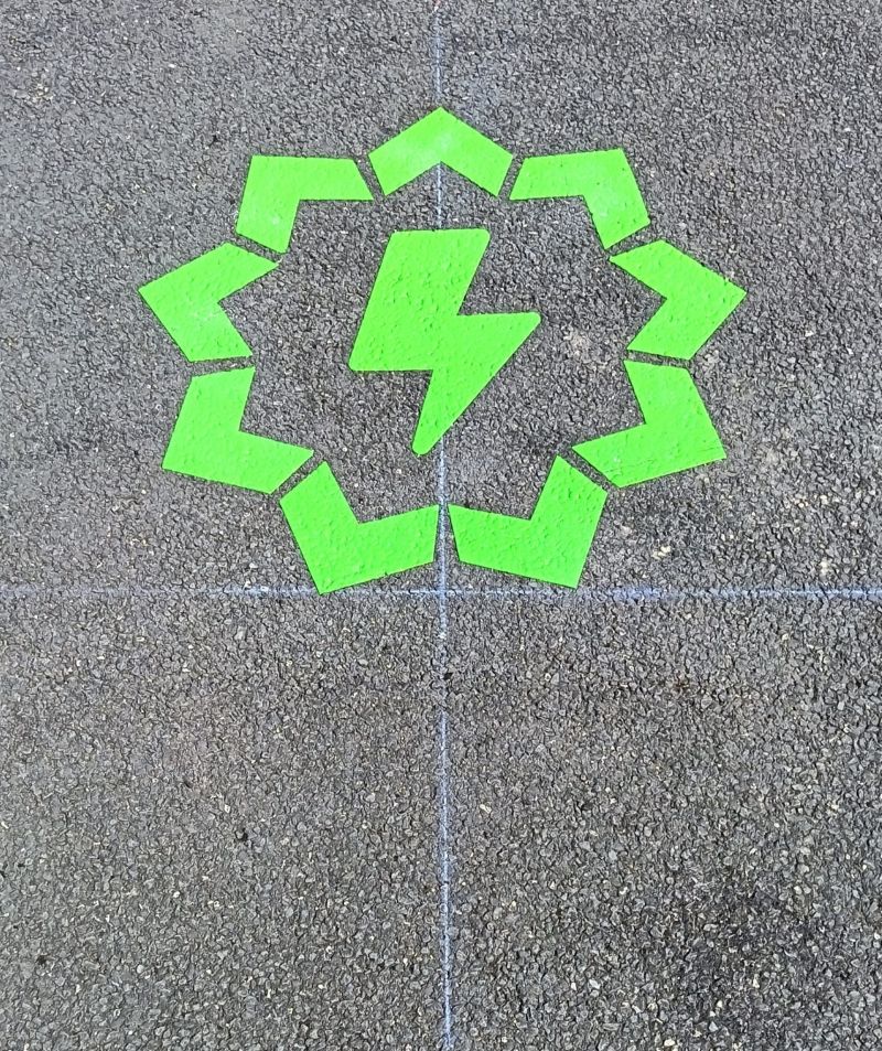 Preformed thermoplastic EV symbol